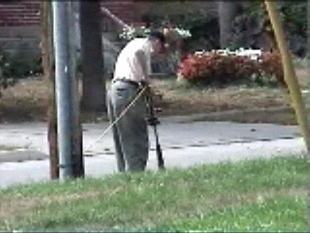 oldmanjoeweedwackin.jpg